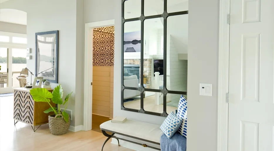 A living room filled with furniture and a window