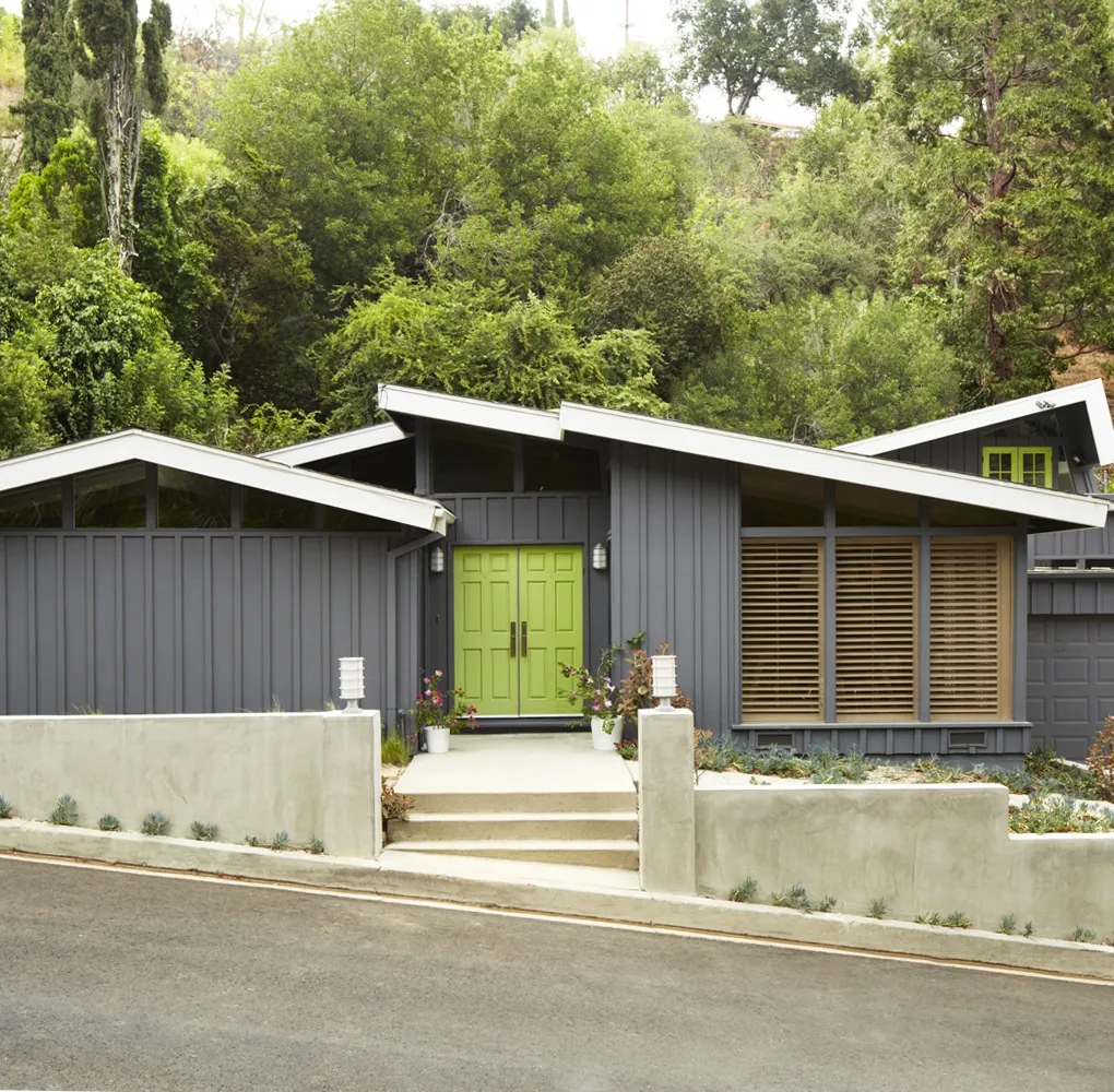 A house with trees in the background