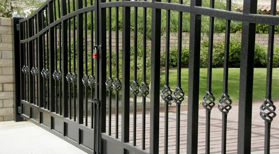 A gate in front of a fence