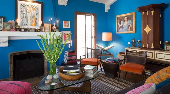 A living room filled with furniture and a fireplace