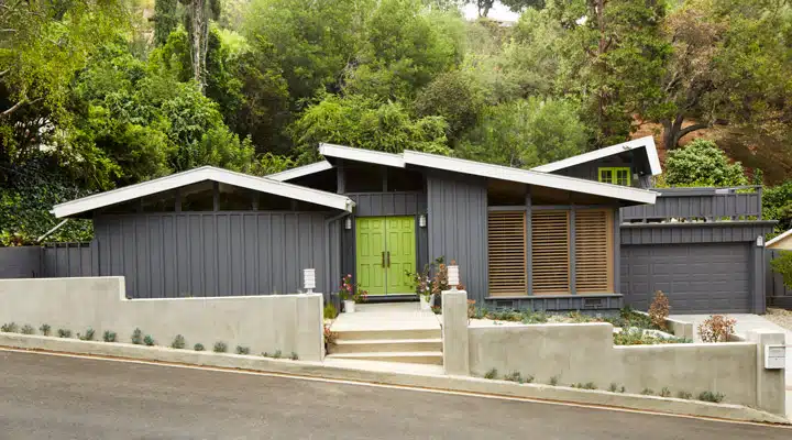 A house with trees in the background