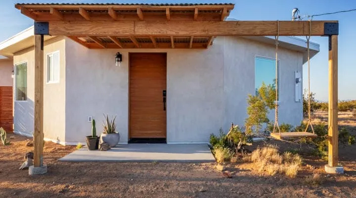 A house with trees in the background