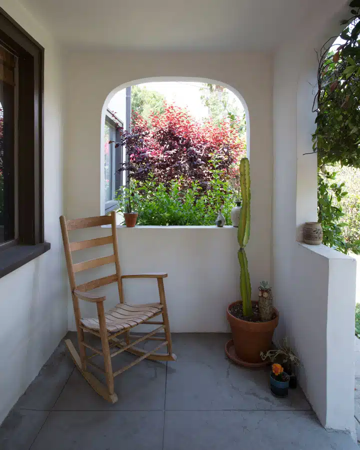 A room filled with furniture and a large window