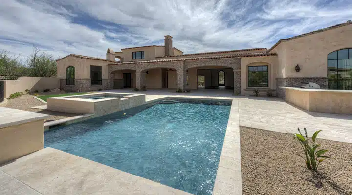 A pool next to a building