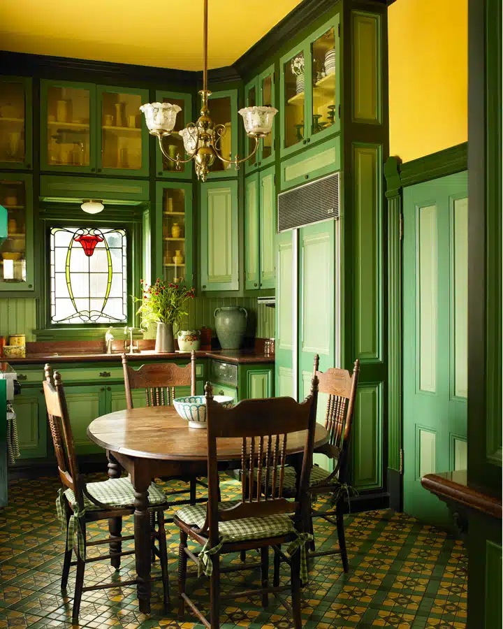 A dining room table in front of a window