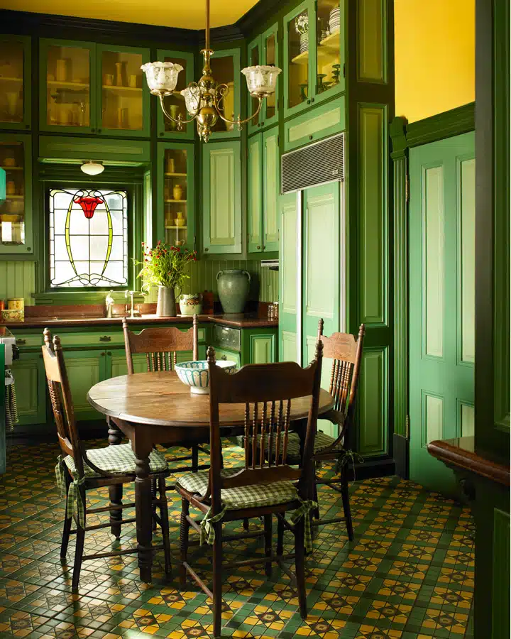 A dining room table in front of a window