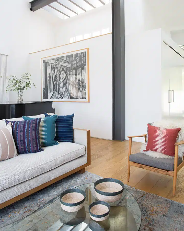 A living room filled with furniture and a fireplace