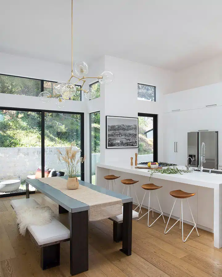 A living room filled with furniture and a large window