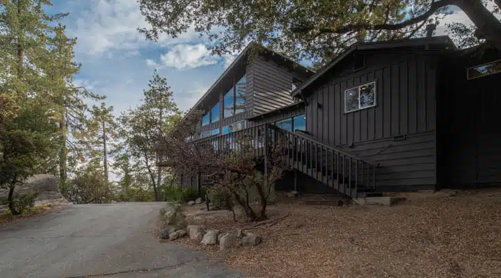 A house with trees in the background