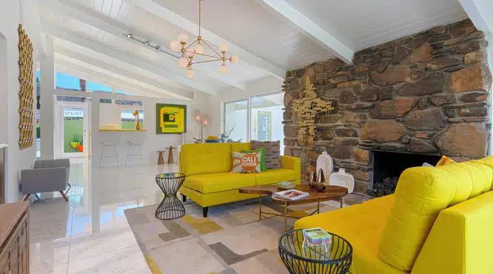A living room filled with furniture and a fireplace