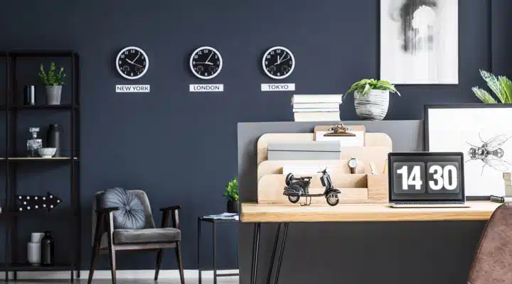 A desk with a computer on a table