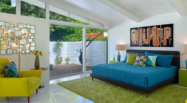 A living room filled with furniture and a large window