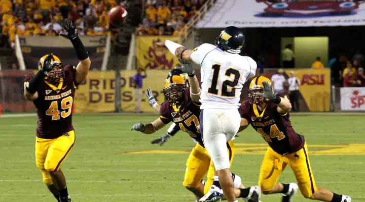 A group of football players playing a football game