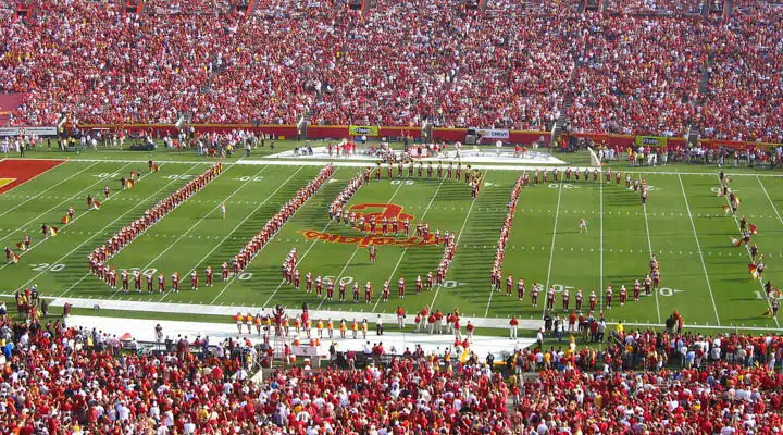 A stadium with a large crowd of people