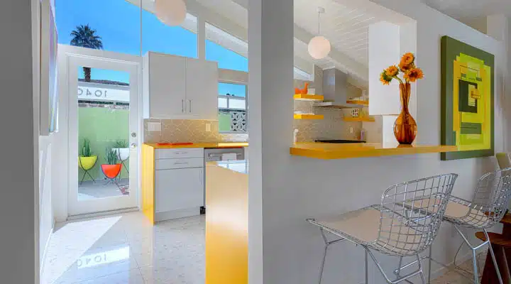 A dining room table in front of a window