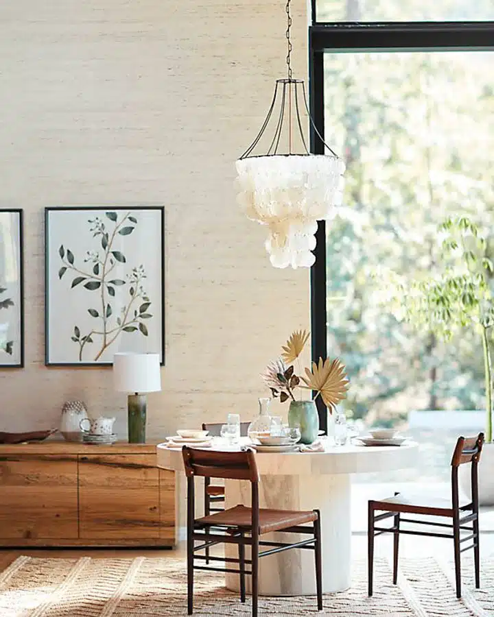 A living room filled with furniture and a large window