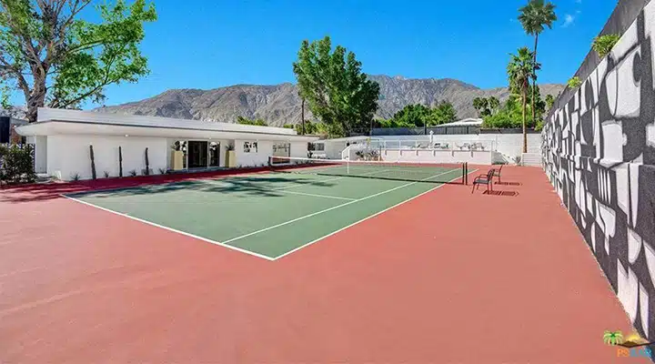 A person on a court with a racket