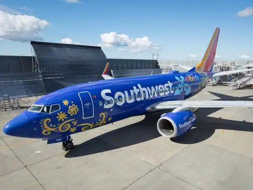 A large passenger jet sitting on top of a tarmac