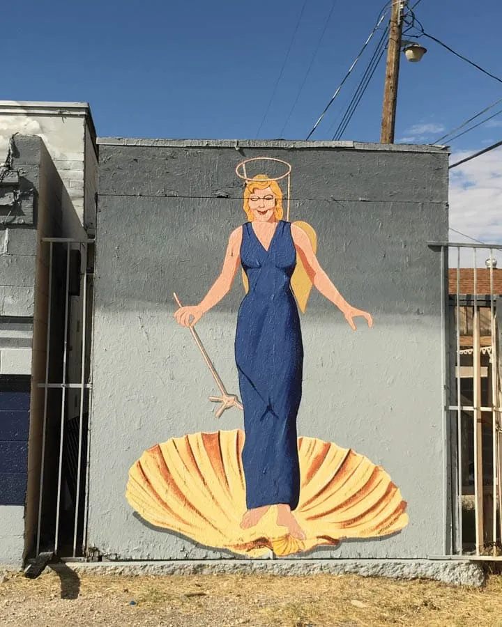 A person standing in front of a building