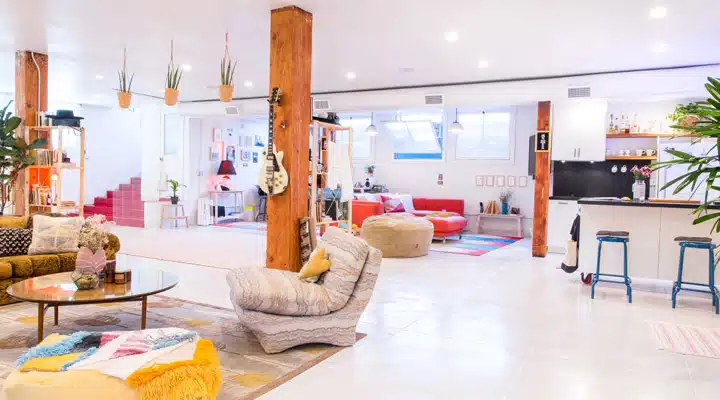 A living room filled with furniture and a fireplace