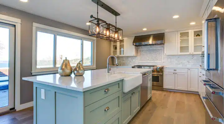 A kitchen with a sink and a window