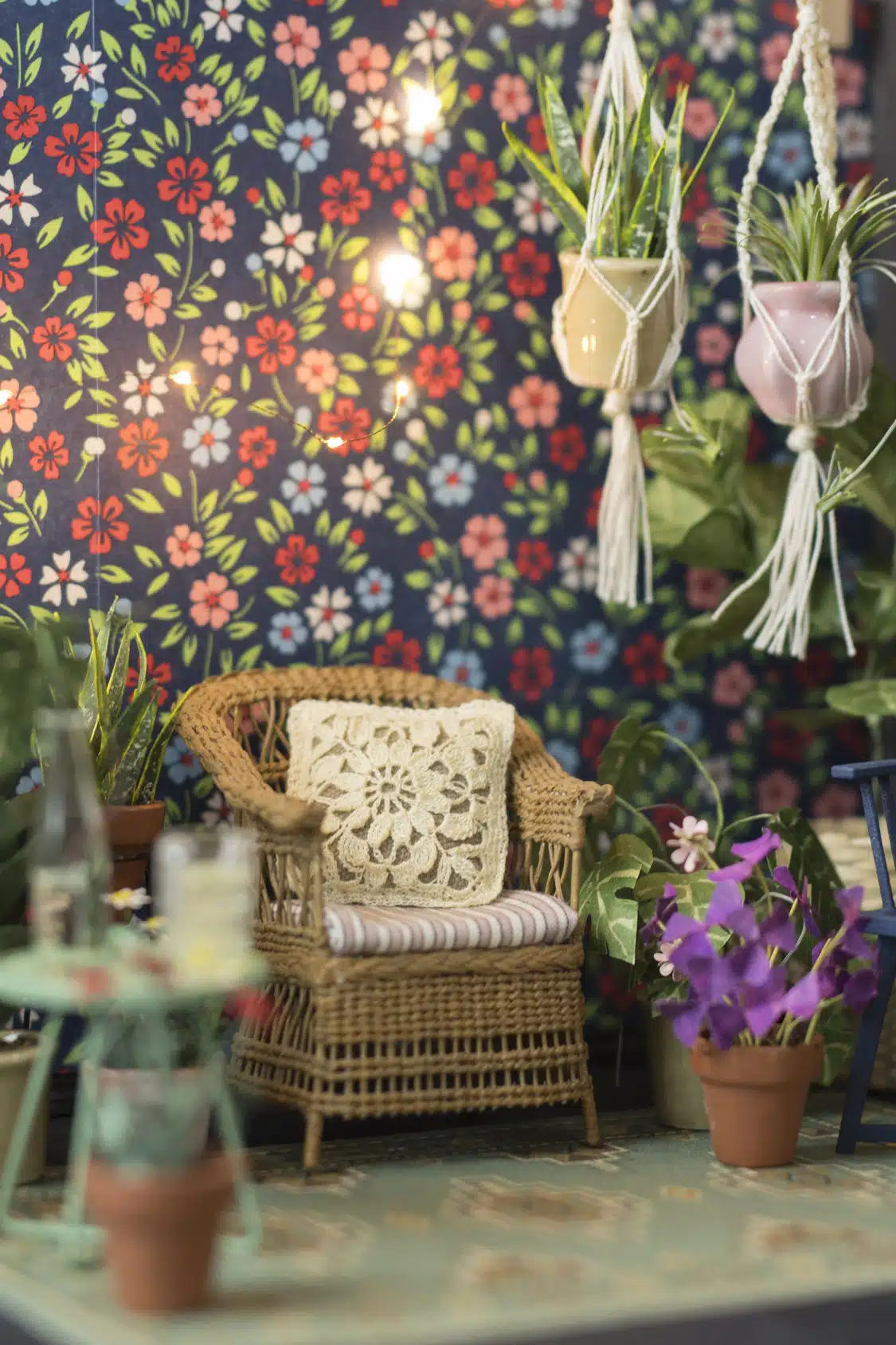 A room filled with furniture and vase of flowers on a table