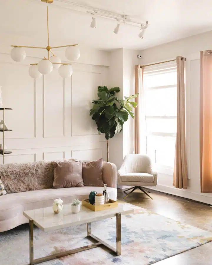 A living room filled with furniture and a fireplace