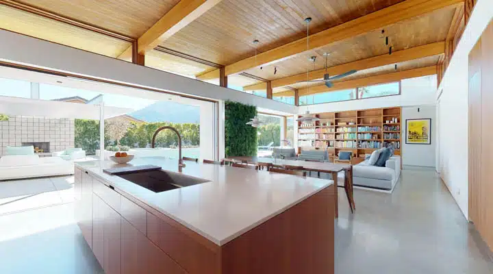 A kitchen with an island in the middle of a room