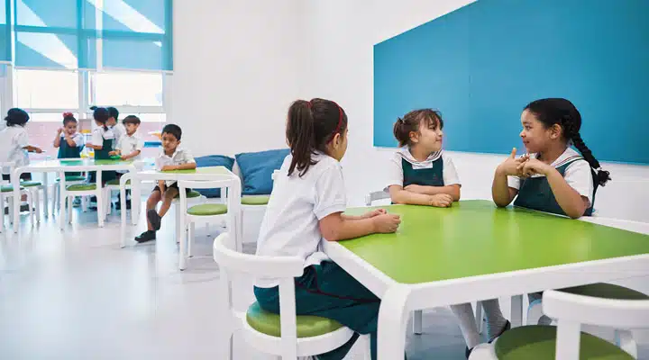 A group of people sitting at a table