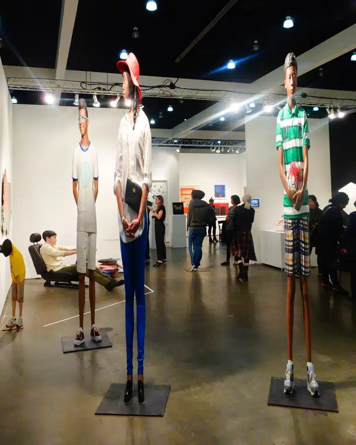 A group of people standing in a room