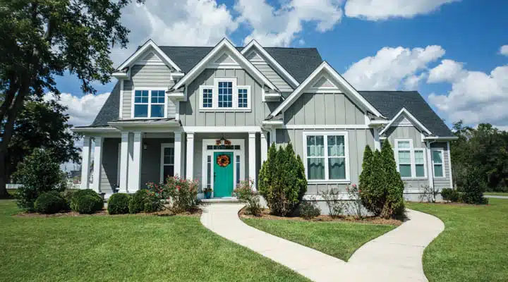 A large lawn in front of a house