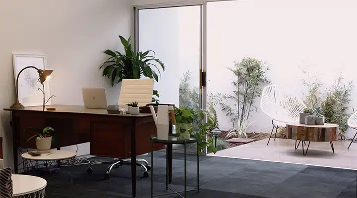 A living room filled with furniture and a large window