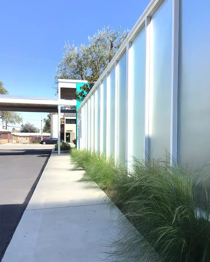 A train is parked on the side of a building