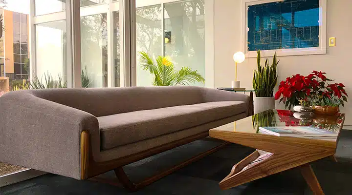 A living room filled with furniture and a large window