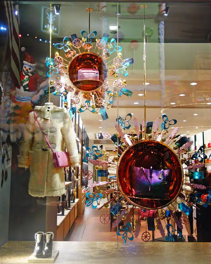 A group of stuffed animals on display in a store