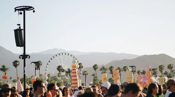 A group of people standing in front of a crowd