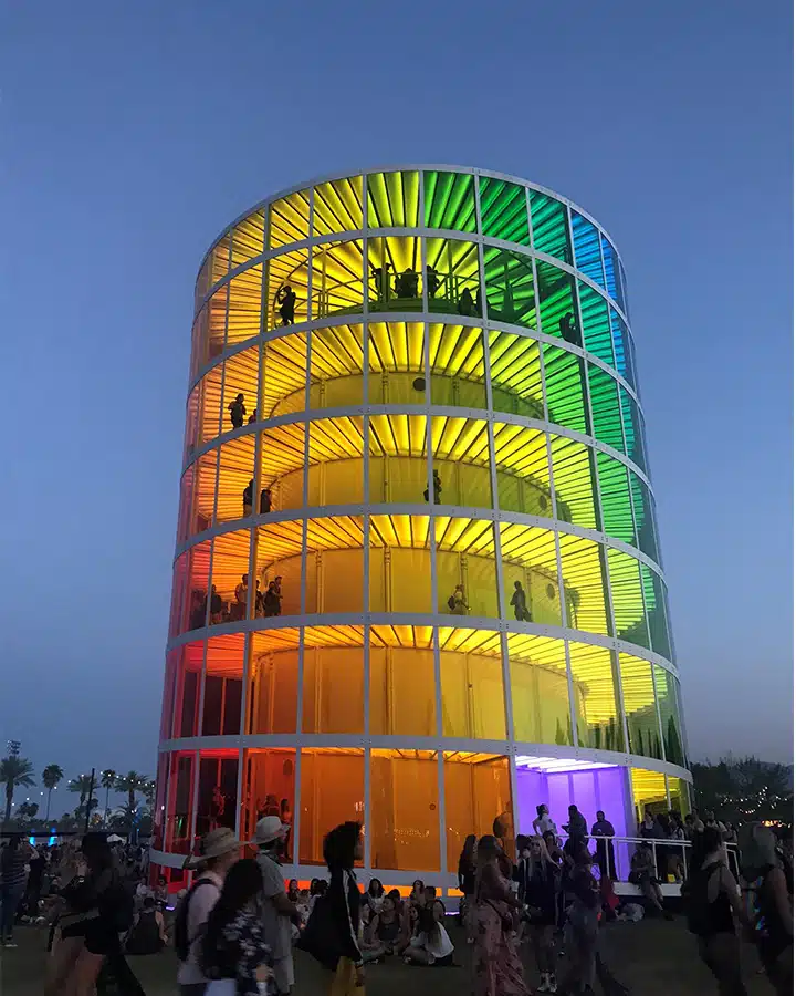 A group of people standing in front of a building