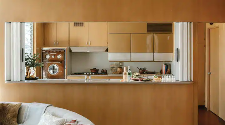 A kitchen with a sink and a window