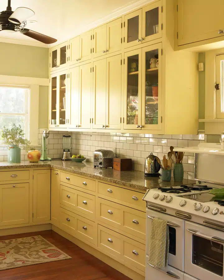 A kitchen with a sink and a window