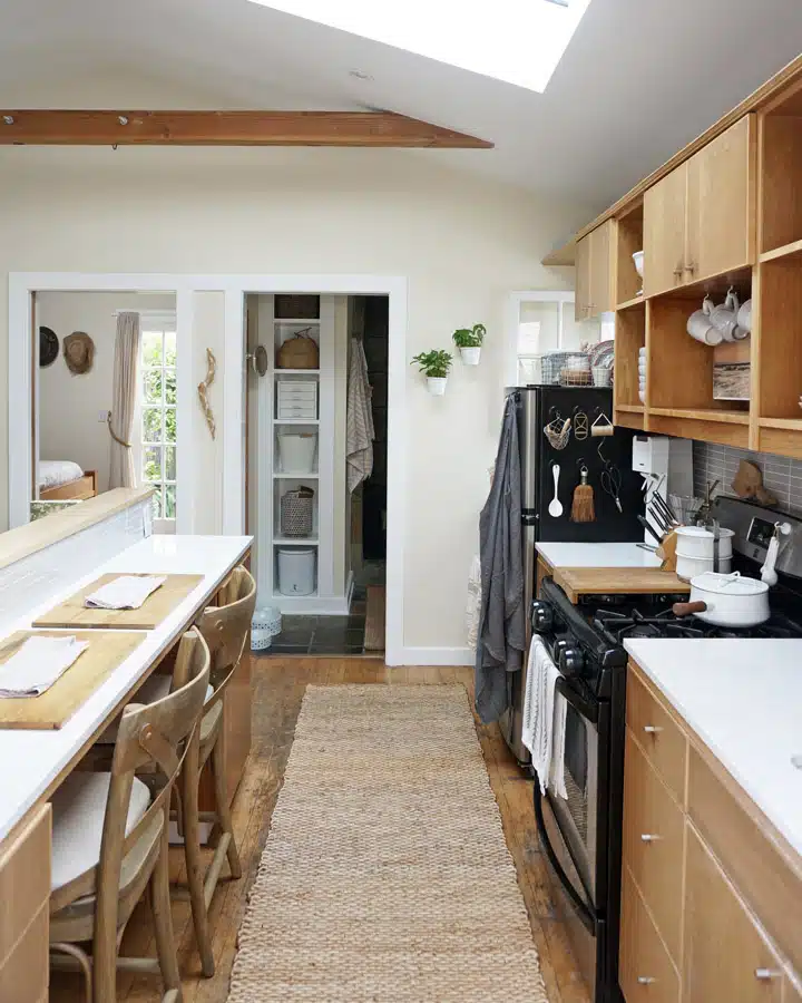 A kitchen with an island in the middle of a room