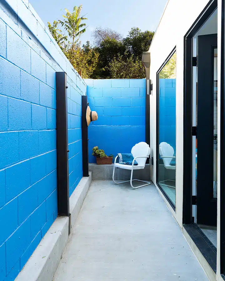 A close up of a blue door