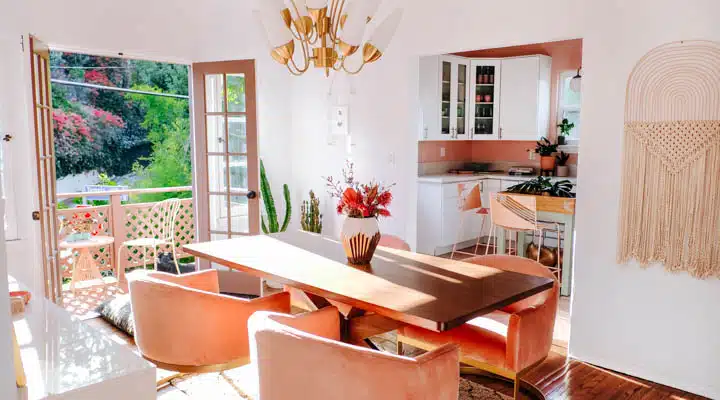 A dining room table in front of a window