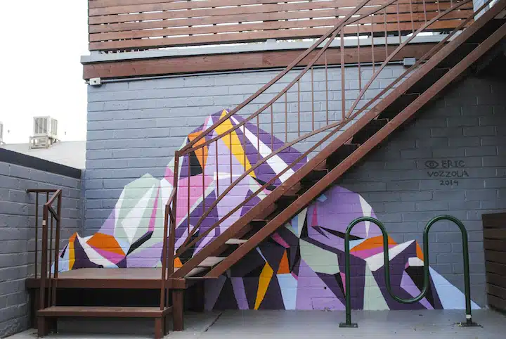 A chair sitting in front of a building