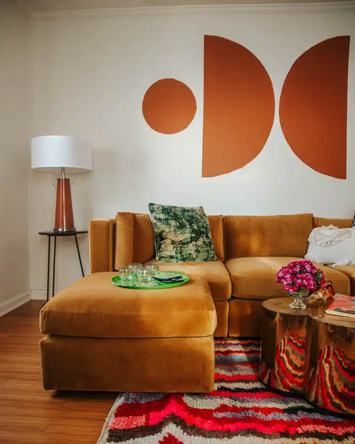 A living room filled with furniture and a lamp