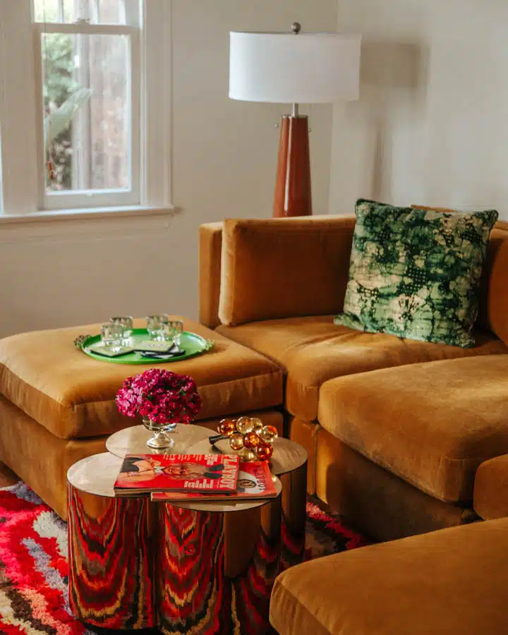 A living room filled with furniture and a large window