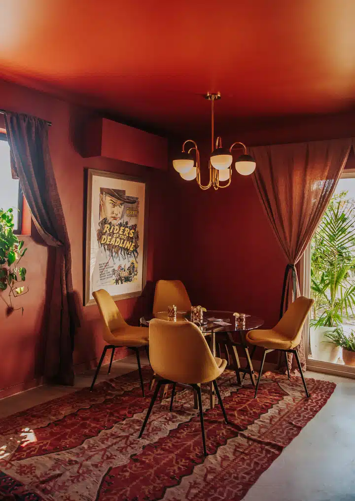 A living room filled with furniture and a fire place