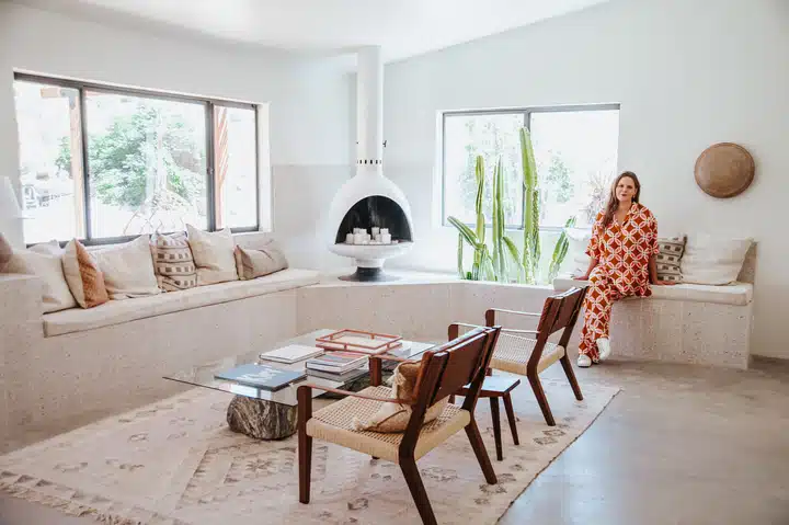 A living room filled with furniture and a fireplace