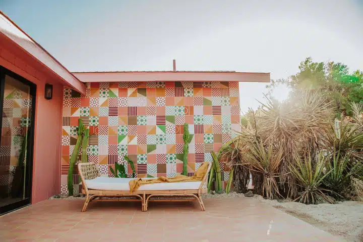 A bench in front of a house