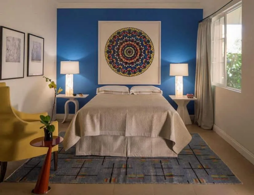 A room filled with furniture and a large window