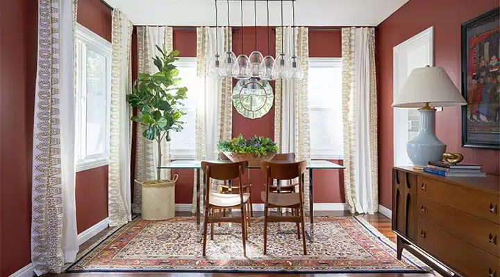 A living room filled with furniture and a large window